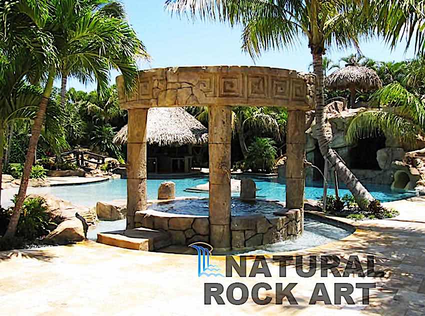 Island theme pool using simulated rock.